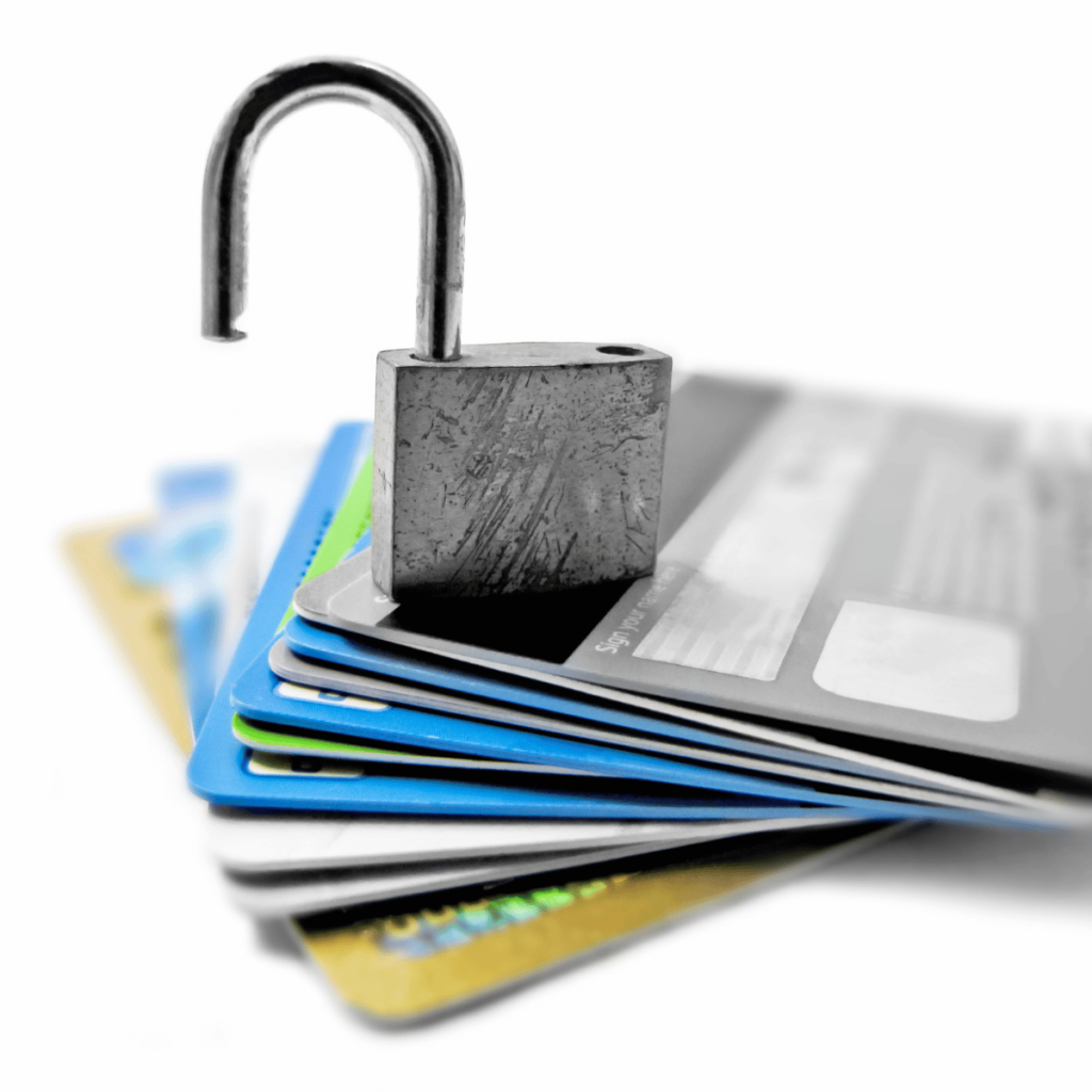 Image of a small pile of credit cards with a padlock on top.
