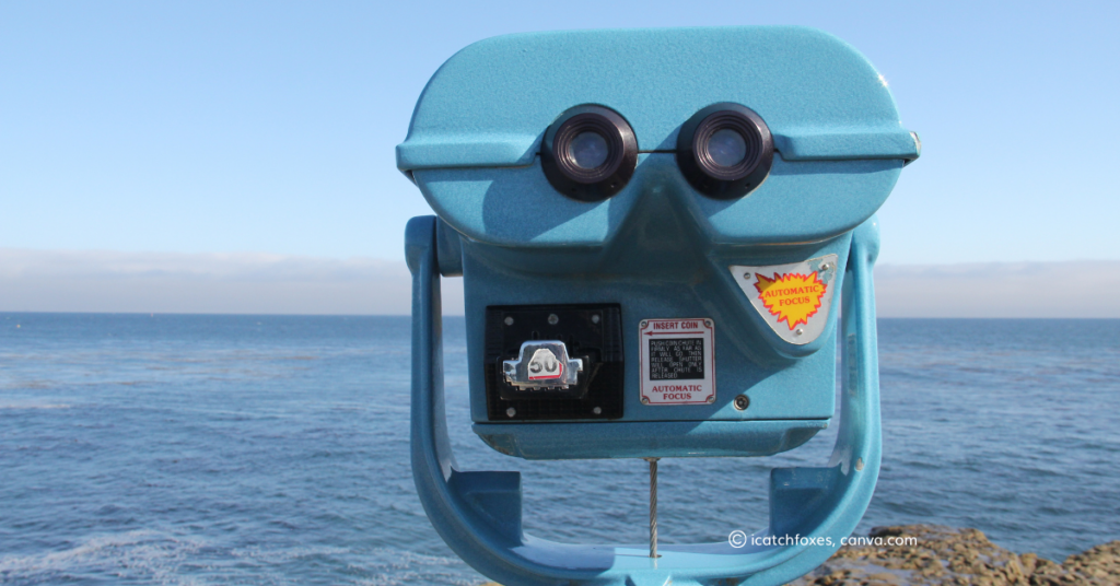 Pay per view binoculars at the seaside, by icatchfoxes, canva.com