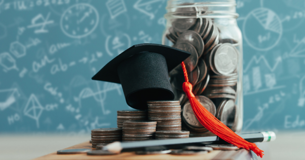 An image of coins in a jar, with a graduation cap sitting on top.